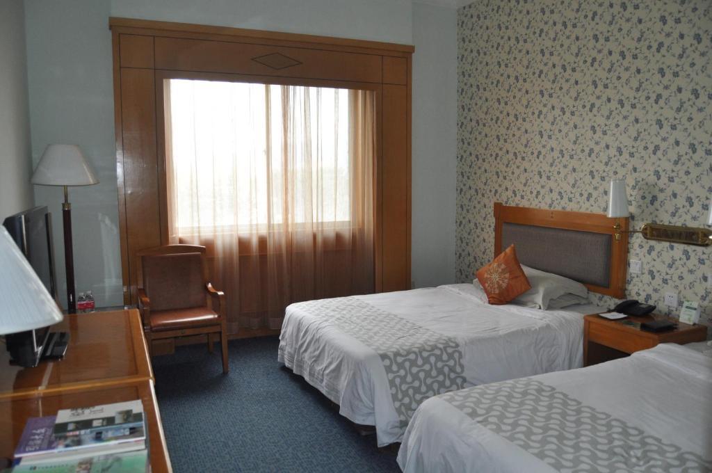 Dazhong International Conference Hotel Xangai Quarto foto